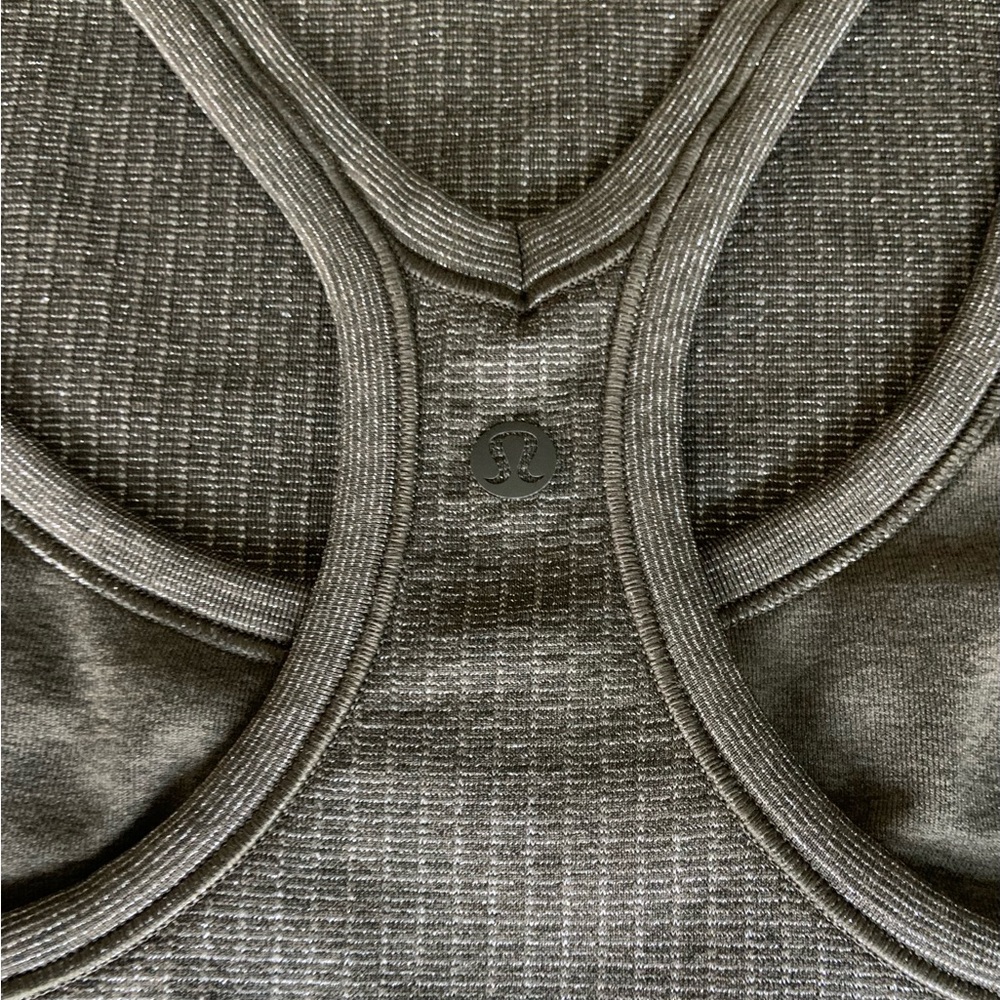 Lululemon ~ EBB TO STREET TANK ~ * SHINE *
Olive~Silver *SHINE* - Picture 2 of 12